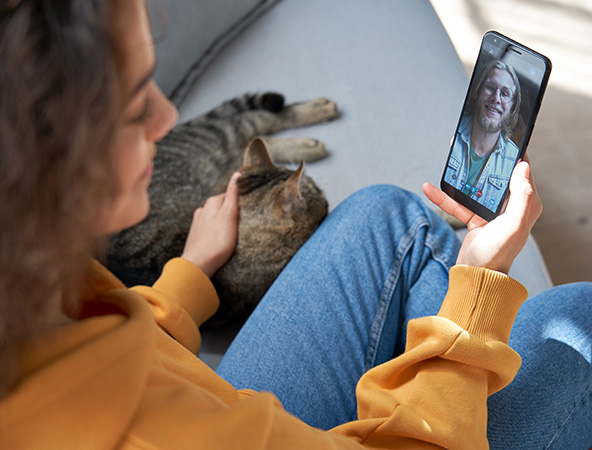 Woman on video call through her cell phone